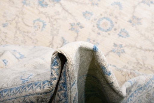 Backside of handmade New Tabriz rug showing knot structure and weave density