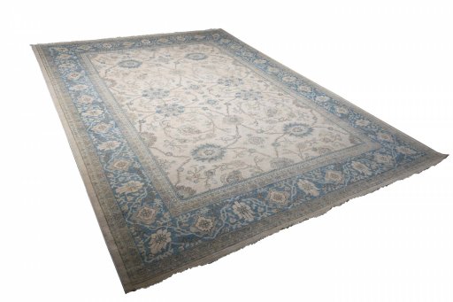 Corner detail of New Tabriz rug showing border pattern and Wool pile