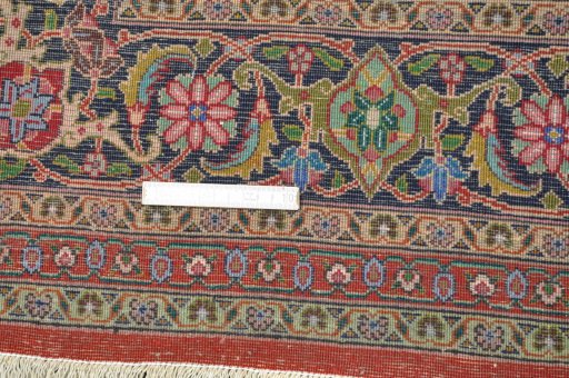 Corner detail of New Tabriz rug showing border pattern and Cork pile