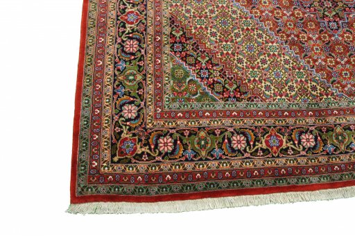 Backside of handmade New Tabriz rug showing knot structure and weave density