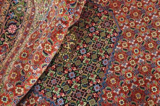 Full view of New Tabriz rug from Iran / Persia, 300 × 206 cm in Red tones