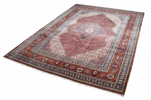 Close-up detail of 2000s Tabriz rug from Iran / Persia showing Wool weave