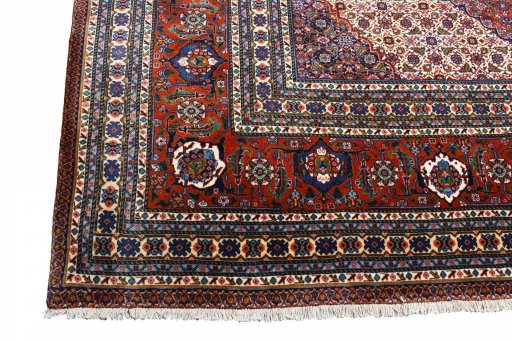 Surface texture of 2000s Tabriz rug with natural Wool and intricate pattern