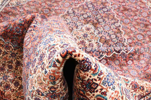 Surface texture of 1970s Tabriz rug with natural Wool and intricate pattern