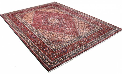 Corner detail of 1970s Tabriz rug showing border pattern and Wool pile