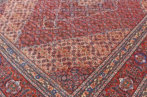 Backside of handmade 1970s Tabriz rug showing knot structure and weave density