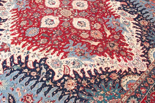 Corner detail of 1930s Tabriz rug showing border pattern and Wool pile