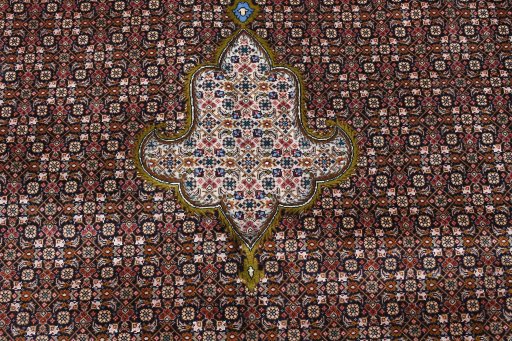 Close-up detail of 2000s Tabriz rug from Iran / Persia showing Cork weave