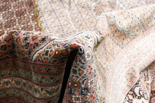 Close-up detail of 2000s Tabriz rug from Iran / Persia showing Cork weave