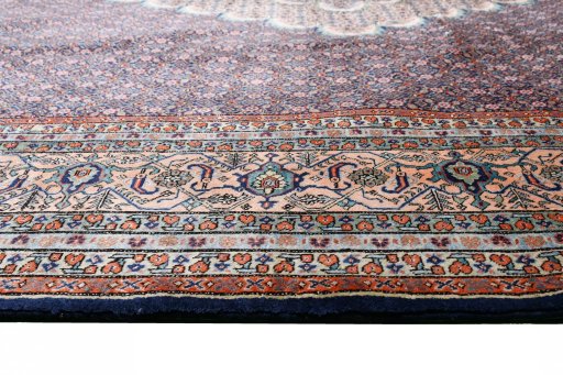 Close-up detail of 2000s Tabriz rug from Iran / Persia showing Wool weave