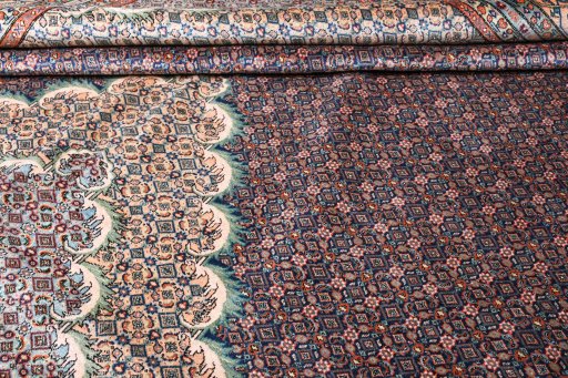 Central medallion detail of 2000s Tabriz rug from Iran / Persia