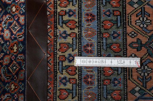 Close-up detail of 2000s Tabriz rug from Iran / Persia showing Wool weave