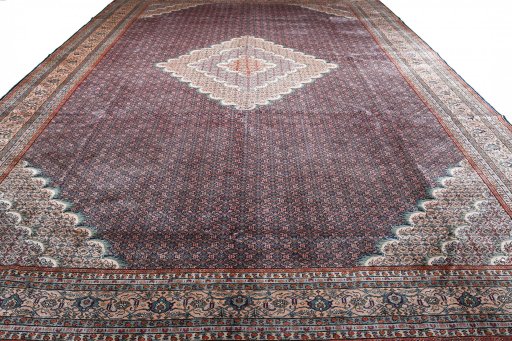 Close-up detail of 2000s Tabriz rug from Iran / Persia showing Wool weave