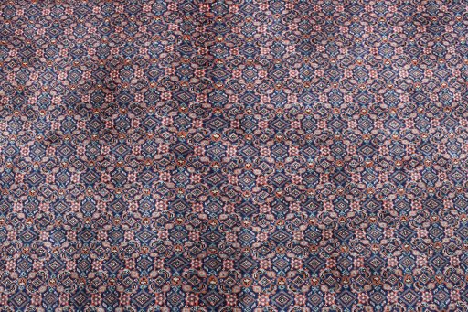 Close-up detail of 2000s Tabriz rug from Iran / Persia showing Wool weave