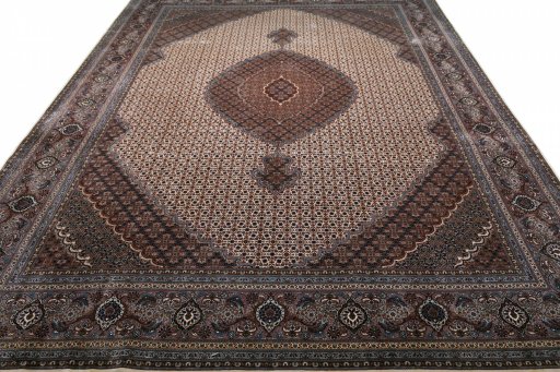 Surface texture of New Tabriz rug with natural Wool and intricate pattern