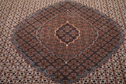 Close-up detail of New Tabriz rug from Iran / Persia showing Wool weave