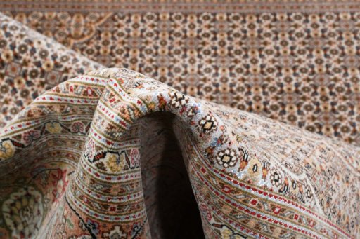 Surface texture of New Tabriz rug with natural Wool and intricate pattern