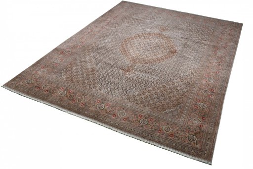 Close-up detail of New Tabriz rug from Iran / Persia showing Wool weave