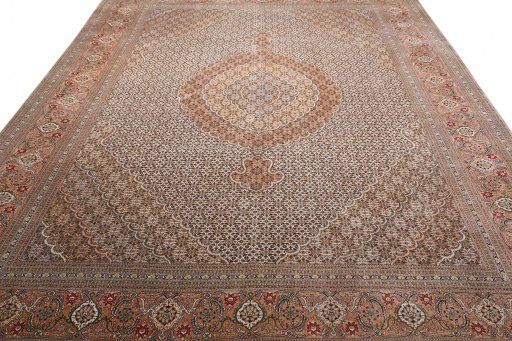 Surface texture of New Tabriz rug with natural Wool and intricate pattern