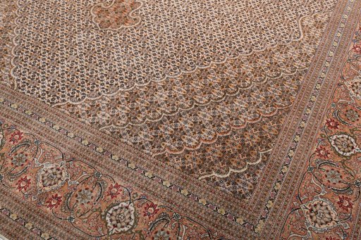 Backside of handmade New Tabriz rug showing knot structure and weave density