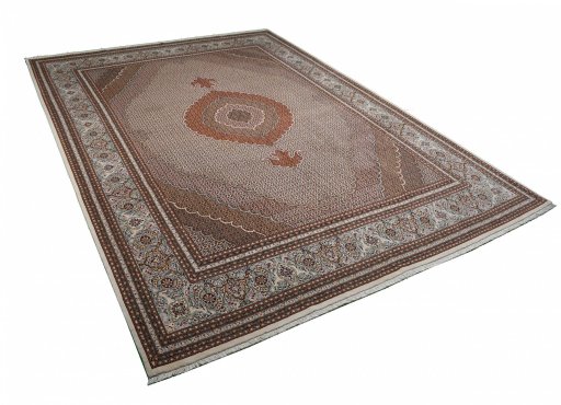Corner detail of New Tabriz rug showing border pattern and Cork pile