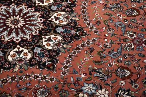 Backside of handmade New Tabriz rug showing knot structure and weave density