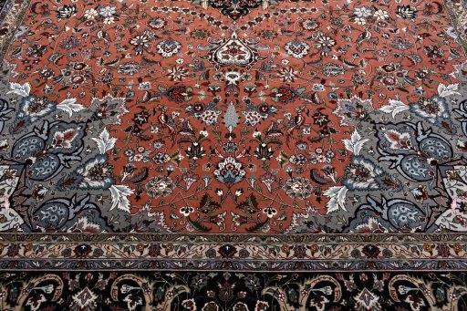 Backside of handmade New Tabriz rug showing knot structure and weave density