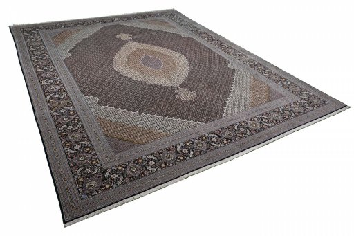 Corner detail of New Tabriz rug showing border pattern and Cork pile