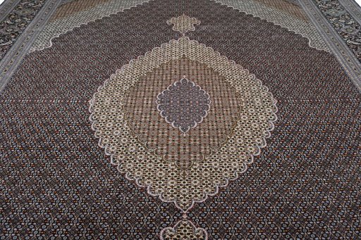 Close-up detail of New Tabriz rug from Iran / Persia showing Cork weave