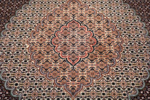 Corner detail of New Tabriz rug showing border pattern and Cork pile
