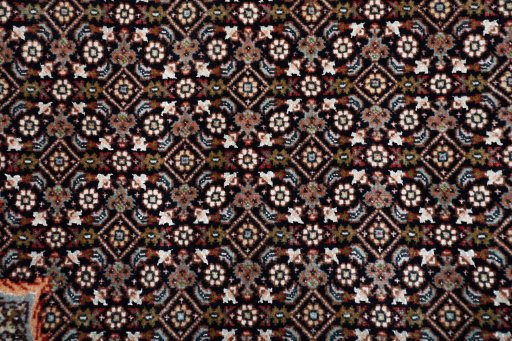 Close-up detail of New Tabriz rug from Iran / Persia showing Cork weave