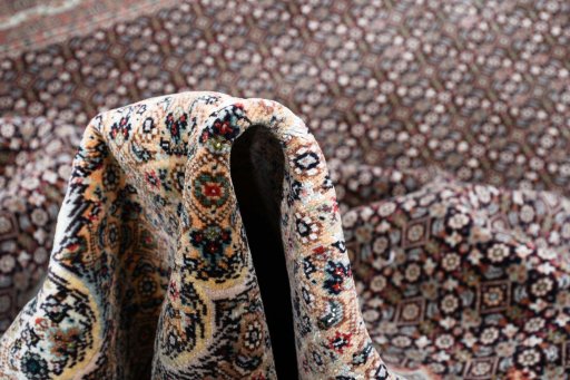Central medallion detail of New Tabriz rug from Iran / Persia