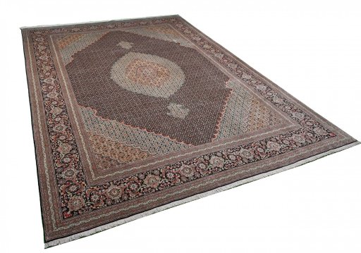 Corner detail of New Tabriz rug showing border pattern and Cork pile