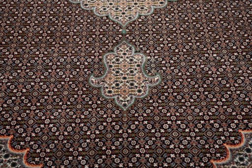 Backside of handmade New Tabriz rug showing knot structure and weave density