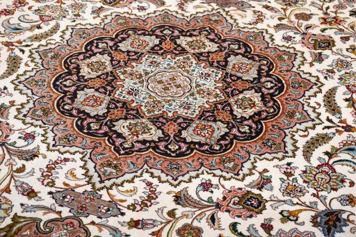 Corner detail of New Tabriz rug showing border pattern and Cork pile