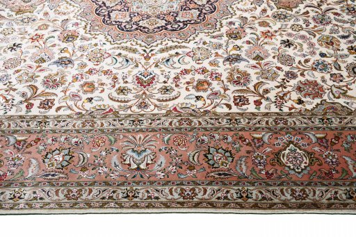 Close-up detail of New Tabriz rug from Iran / Persia showing Cork weave