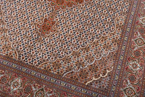 Close-up detail of New Tabriz rug from Iran / Persia showing Cork weave