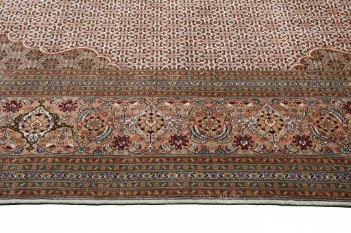 Corner detail of New Tabriz rug showing border pattern and Cork pile