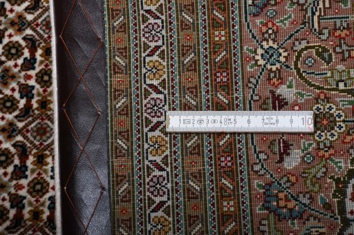 Central medallion detail of New Tabriz rug from Iran / Persia
