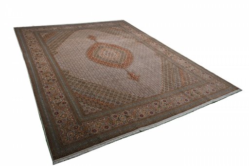 Corner detail of New Tabriz rug showing border pattern and Cork pile