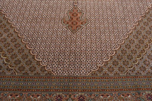 Backside of handmade New Tabriz rug showing knot structure and weave density