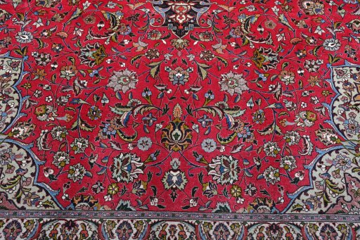 Surface texture of 2000s Tabriz rug with natural Cork and intricate pattern