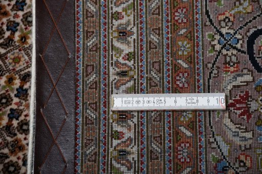 Central medallion detail of New Tabriz rug from Iran / Persia