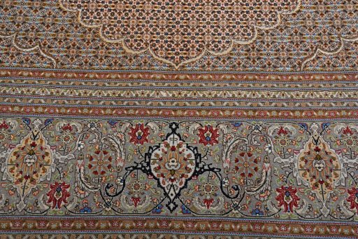 Backside of handmade New Tabriz rug showing knot structure and weave density