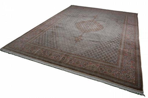 Close-up detail of New Tabriz rug from Iran / Persia showing Cork weave