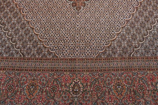 Backside of handmade New Tabriz rug showing knot structure and weave density