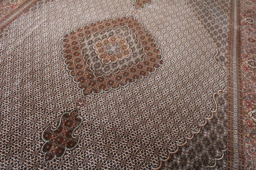 Full view of New Tabriz rug from Iran / Persia, 410 × 300 cm in Beige tones