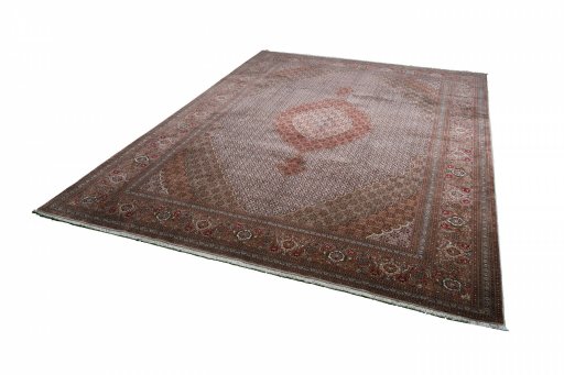 Close-up detail of New Tabriz rug from Iran / Persia showing Cork weave