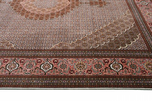 Corner detail of New Tabriz rug showing border pattern and Cork pile