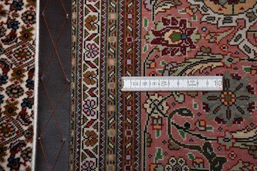 Central medallion detail of New Tabriz rug from Iran / Persia